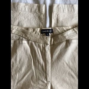 Bebe crapped pants  size 6 96%linen Genuine leather around waist dry clean only